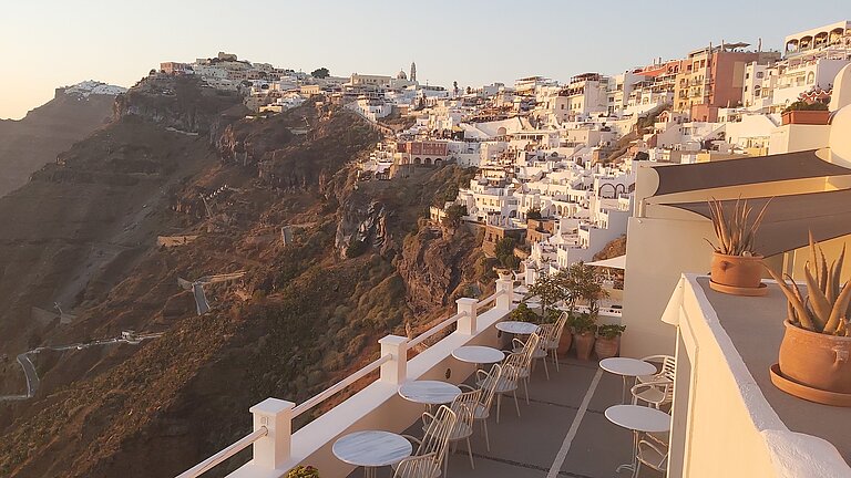 White houses on the height of a slope in the sunshine